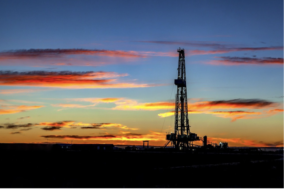 Drilling rig at sunset